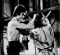 Jackie as a stunt performer in Fist of Fury (1972)