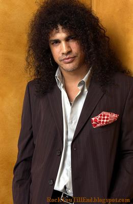  Slash wearing a suit. Bet you never thought you'd see that, right?