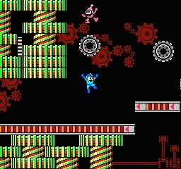 Mega Man traversing Metal Man's stage. 