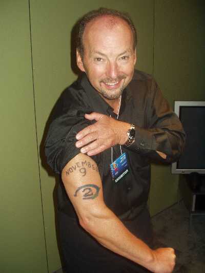 Peter Moore, man of the people, man of easily removable tattoos on one's arm.
