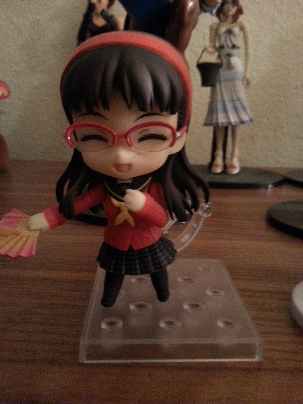 This is a Nendoroid. Also, Yukiko Amagi. She is not in the games I am talking about here.