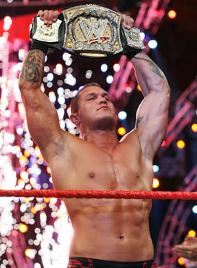 Randy being handed the WWE Title (No Mercy 2007)