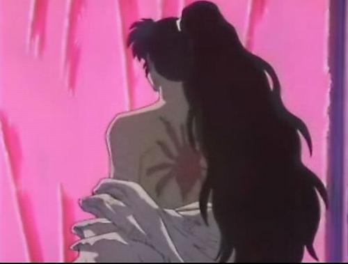 Naraku's back bares the spider-shaped scar of his humanity.