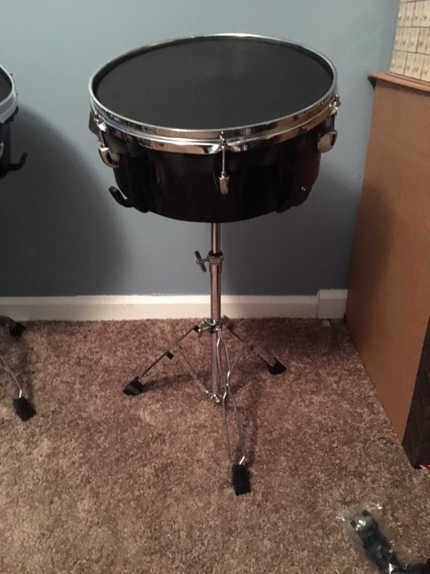 The final product: One completed drum pad on top of a standard snare drum stand.