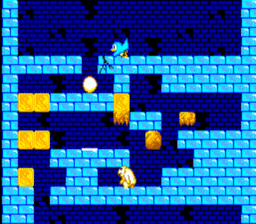 The penguin protagonist, Commander Overbite, pushing an egg down a level.