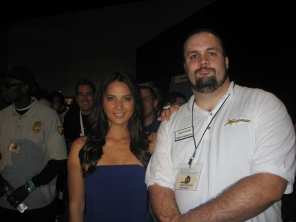DEFENDING VIDEO GAMES TO IDIOT REPORTERS AND HANGING OUT WITH OLIVIA MUNN. DUDE MUST BE DOING SOMETHING RIGHT.