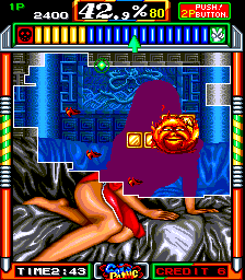The player is the green dot near the top of the playfield. Players must clear 80% of the model's silhouette.