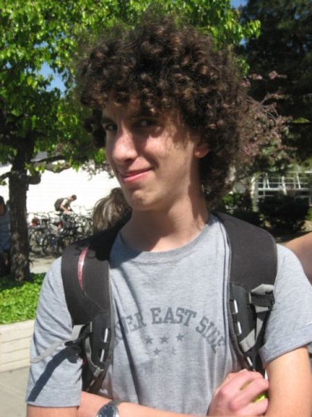 Maracas and curly hair? Clearly this man is up to no good.