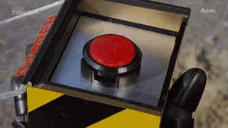 This is a gif. Click to push the button.