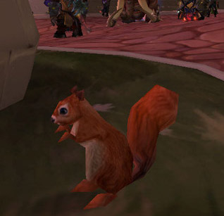 A squirrel in World of Warcraft planting a mine.