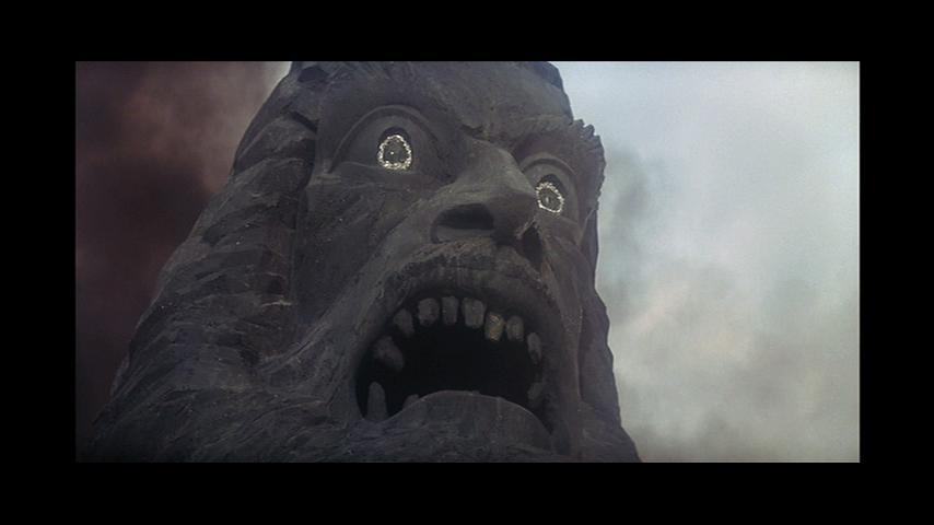 I think the gun-vomiting head from Zardoz would be a better fit.