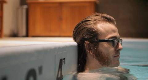  Phil Fish chillin' in a swimming pool. What the fuck were the points of these shots in the documentary? It came off and stupid, pretentious, and laughable.