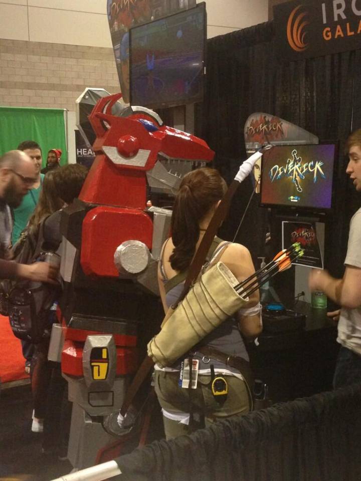 Meanwhile at C2E2 in Chicago, the Red Ranger's T-Rex Zord battles Lara Croft reboot in Divekick