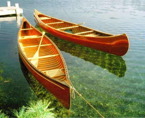 Twin Wooden Canoes.