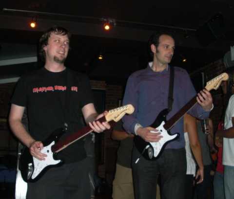 Alex Rigopulos at a Rock Band bar night in 2009. Accompanying him is a sweatier, doughier Alex.