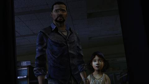  Lee protecting Clementine from those nasty flesh eating zombies.