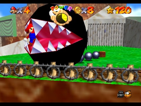 The Chain Chomp's hitbox begins where its black mass touches the ground, so you're perfectly safe in his mouth like this.