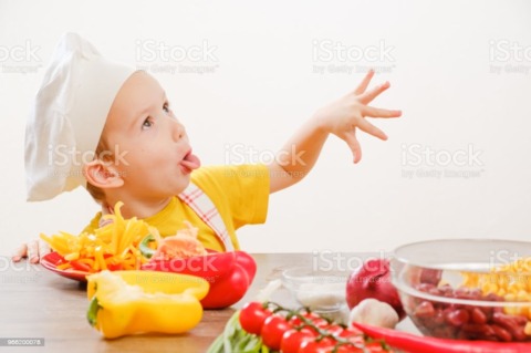 This stock image shows up when you do a search for “Family making burritos”. 