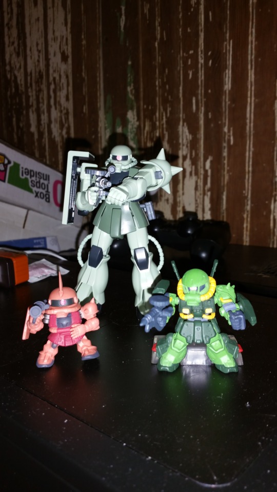 The Char Zaku is a gashapon toy and the other dude is from some little box but wasn't a kit. 