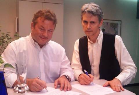 Schaufele (Eddie) and Cihi (James) signing the paperwork to hopefully pave the way forward.
