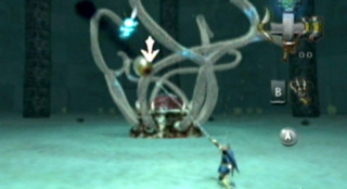 Link Clawshotting the eye in the first stage of the fight