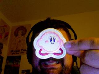       And when I finished the demo, I got this sweet Kirby patch. Yay!