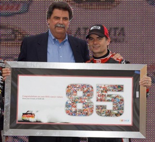 NASCAR President Mike Helton congratulates Jeff on his 85th win