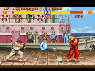 Ryu using a Hadoken against Ken Masters