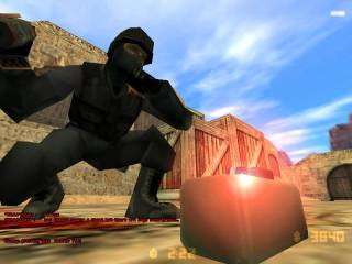 A Counter-Terrorist defusing a bomb in an early beta version of Counter-Strike. 