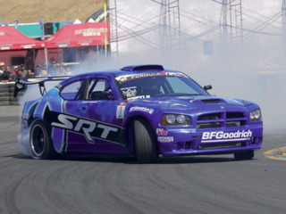 Drift turn. Notice that the tires don´t point in the direction of the corner.
