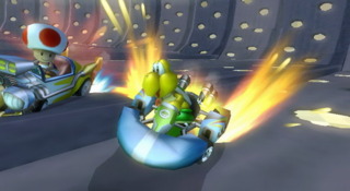 Boost turn in Mario Kart. Notice both the drift angle and the boost ready to be used.