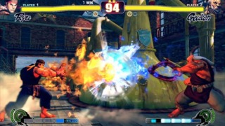 Ryu and his teacher Gouken performing the renowned Hadoken (Surge Fist) against each other in Street Fighter IV.