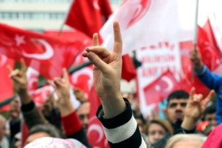 Turkish Wolf hand gesture being used in a MHP political rally