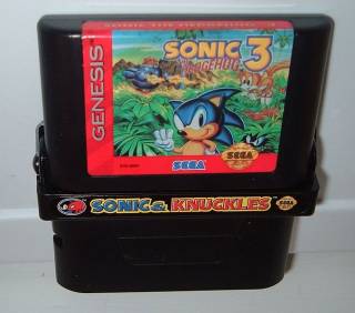 The unique Sonic & Knuckles cartridge, with Sonic the Hedgehog 3 locked on top of it.