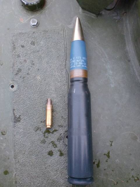  7.62 round (used in  AK-47, MG3) compared to the 30mm round fired form the CV90 
