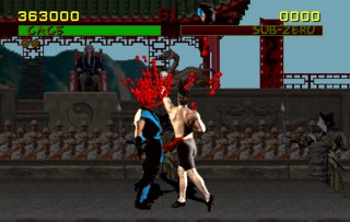 Johnny Cage decapitating Sub-Zero - an example of Mortal Kombat's extreme violence.