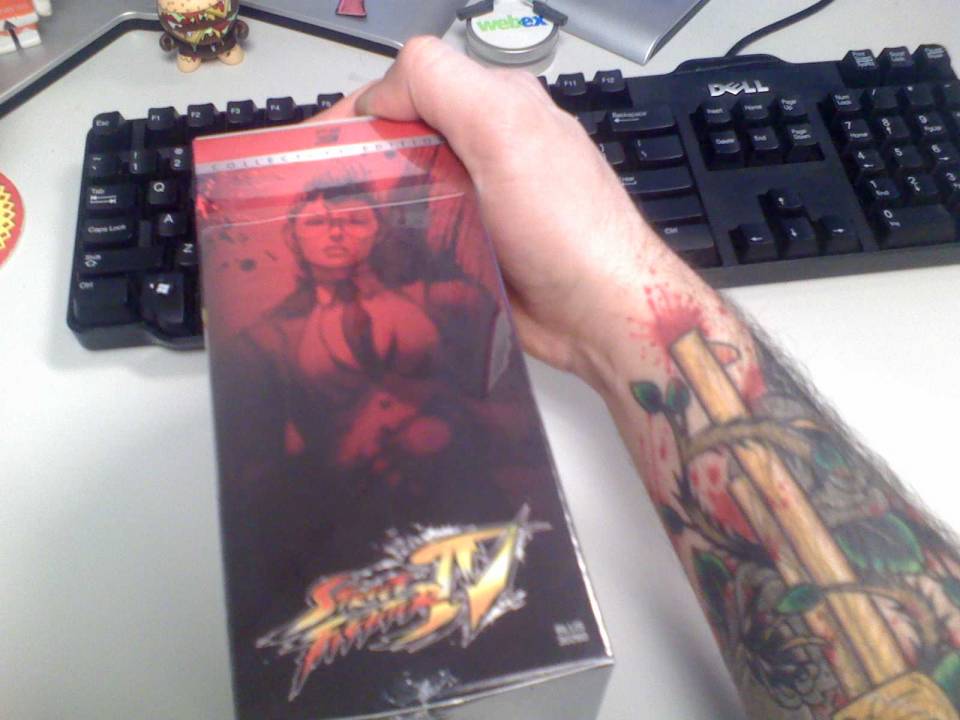 One side of the PS3 Version of SFIV Collector's Edition Box (and my Right-Forearm Tatt)