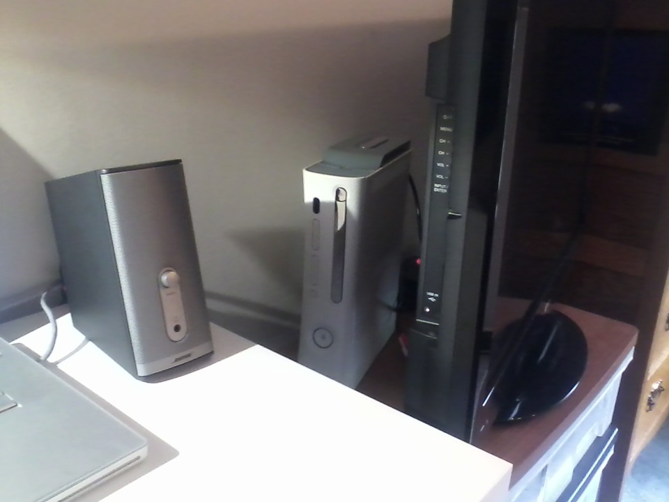 The Xbox 360 hides behind my TV... sneaky, sneaky. Never know what that thing is doin'!