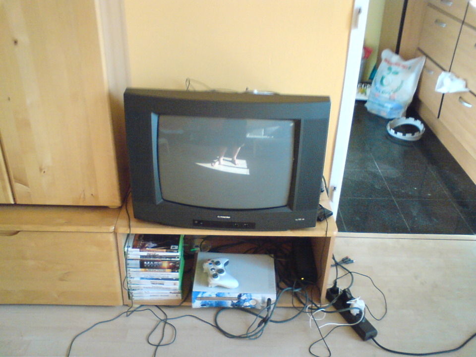 My old, small SD-TV. Thats where the gaming goes on ... can't wait for that TV to break down, so I have a reason to buy a better one :)