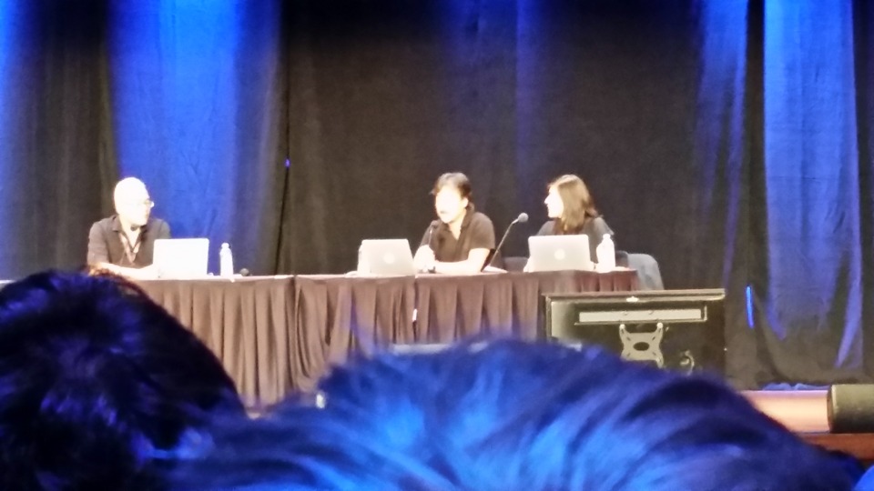 Hironobu Sakaguchi, with moderator and translator. This is as zoomed in as the camera on my phone could get.
