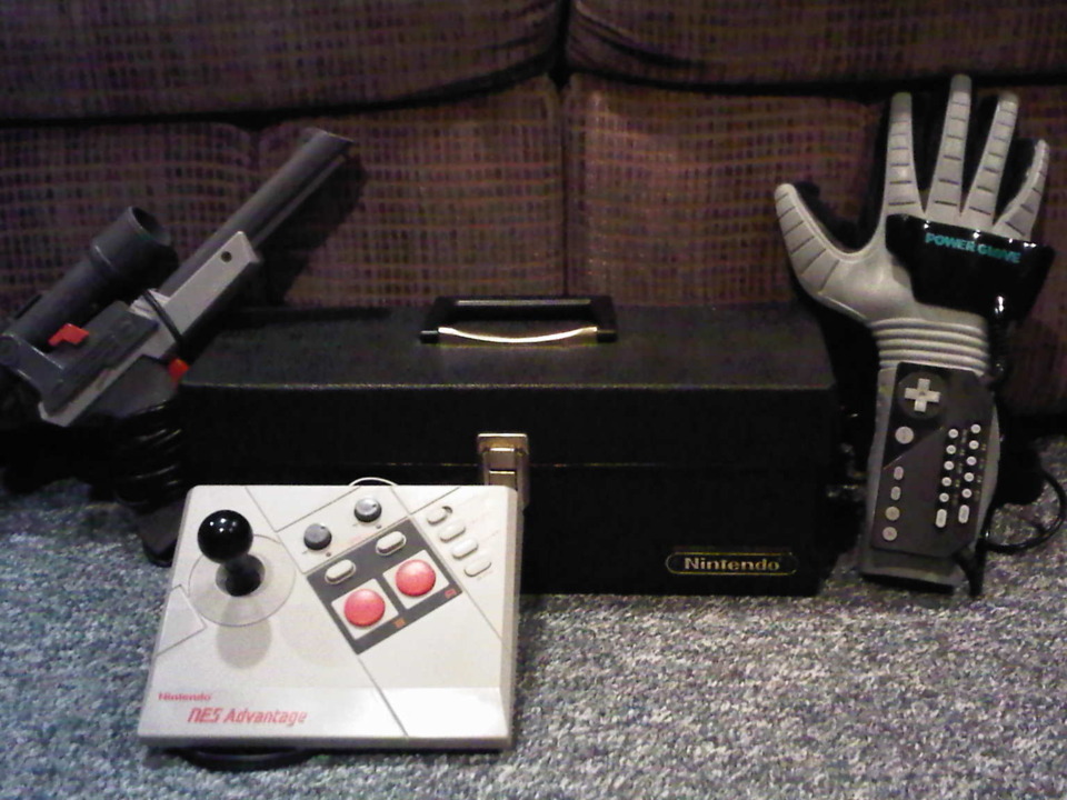  Offical Nintendo carrying case for games, Power Glove, NES Advantage (Have two), NES Grey Zapper (Have two but only one quick scope.) 