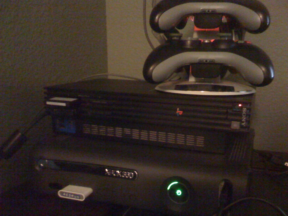 PS2 Fat sitting on my twice red ring'd Elite.