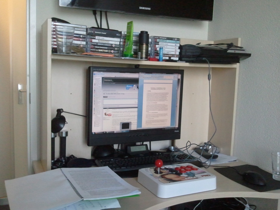 My work place. Stick usually rests upon my PS3. 