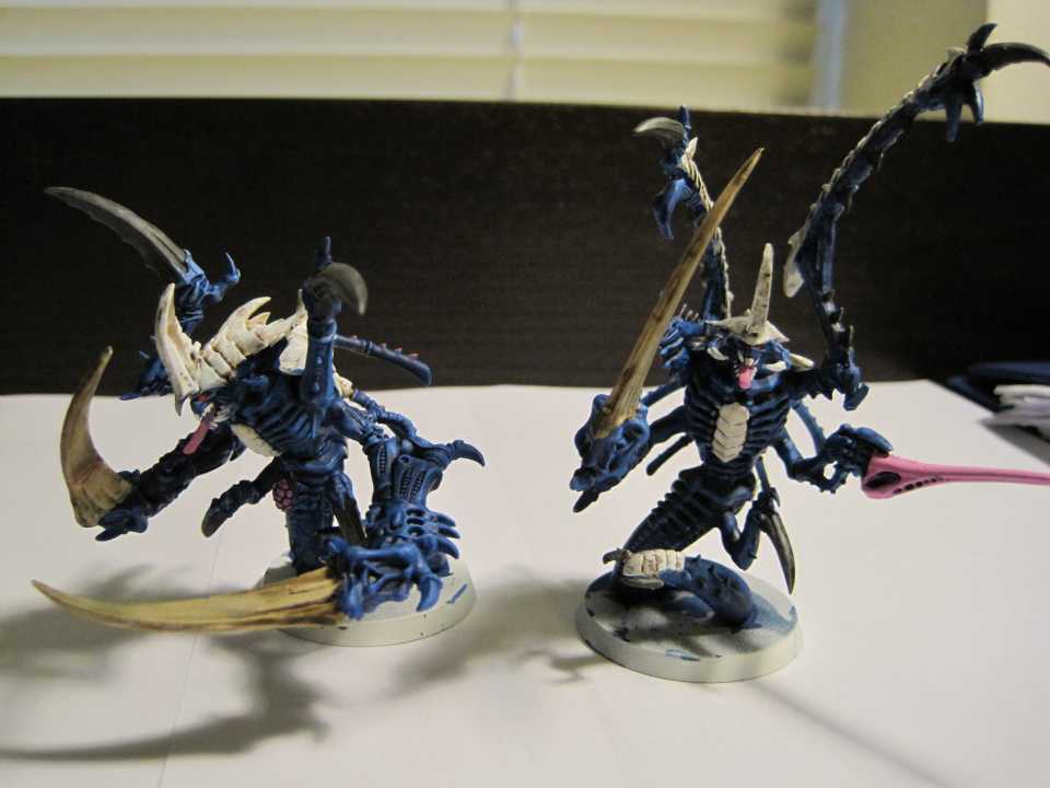 Pair of Tyranid Primes. Left one with Adrenal Glands and Dual Boneswords and the right with Toxin Sacs and Lash Whip