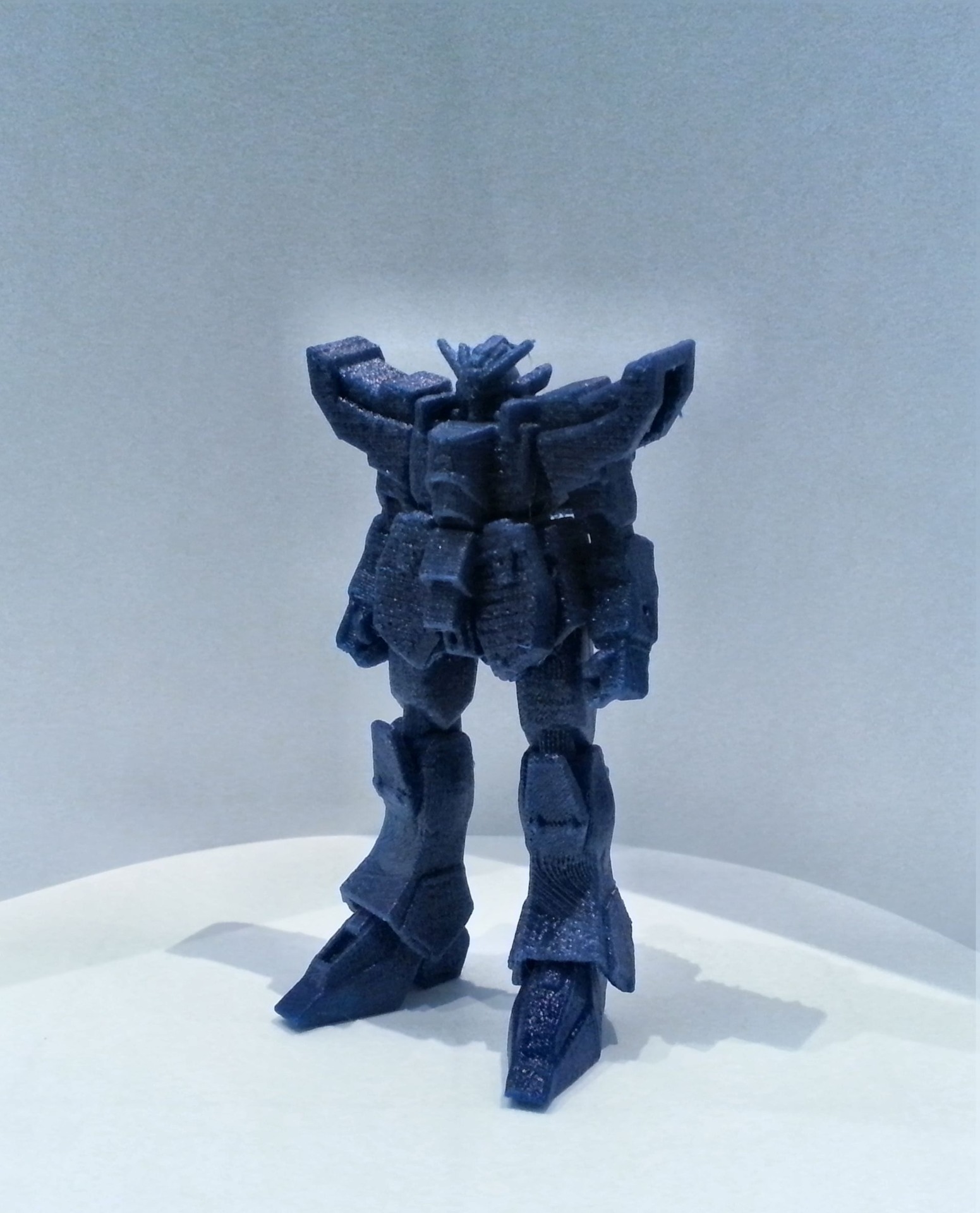 The model is 10.5 cm or about 4 inches tall
