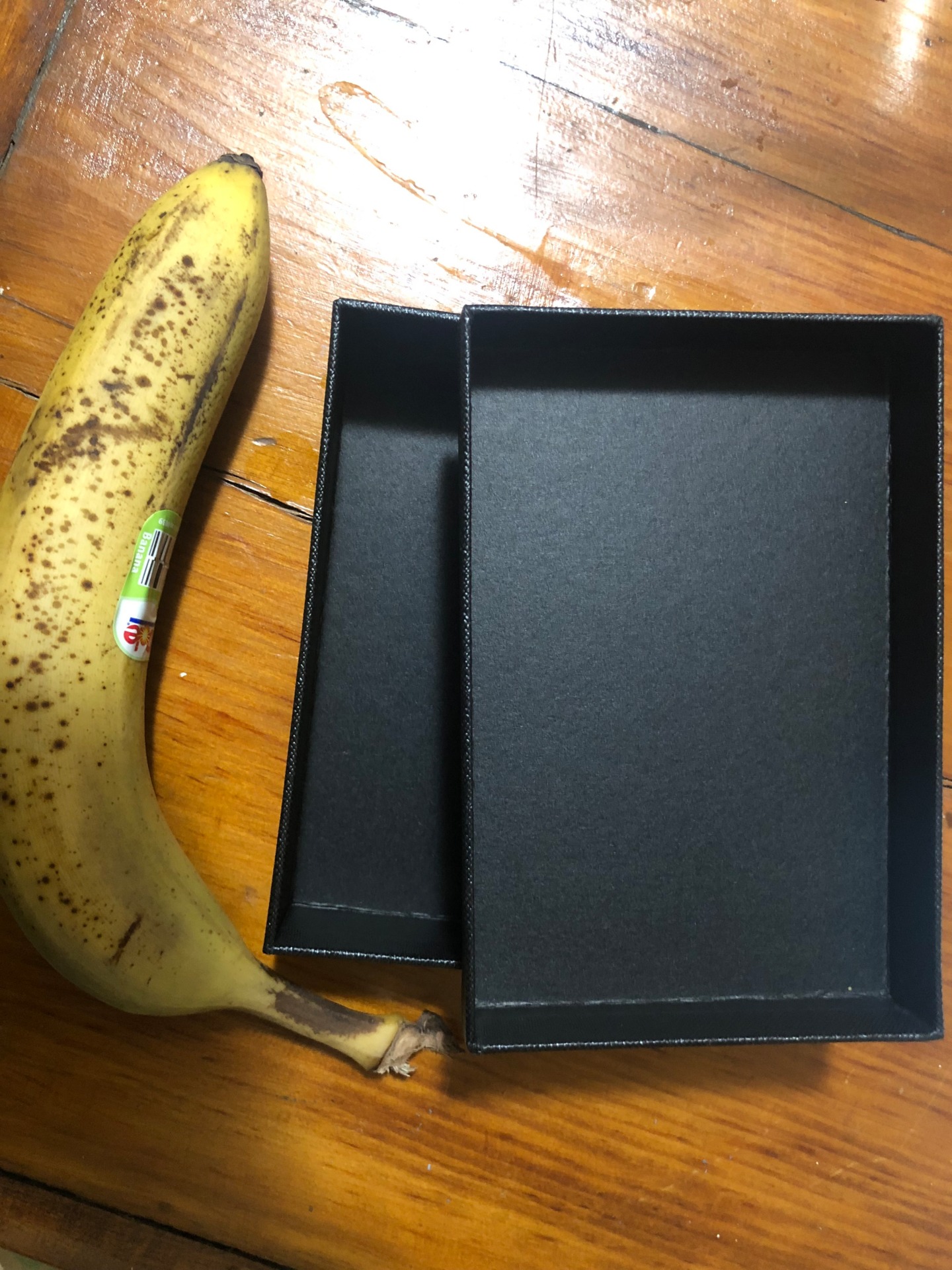 The box has no markings on the outside other than a sticker with a UPC and a serial number, which says Made in China.  The Banana I bought at a grocery store but included for scale.  There was nothing in the box.  What's in the box?  NOTHING! 