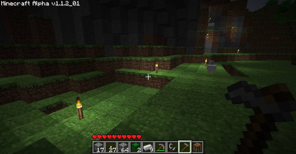  This is pretty close to the starting point.  As you can see, my friends were nice enough to leave a line of torches guiding me from the spawn point towards their developments.  