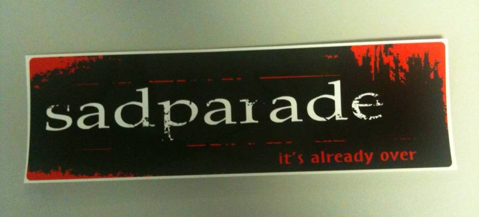 There are a bunch of these bumper stickers for sadparade still floating around PopCap's offices.